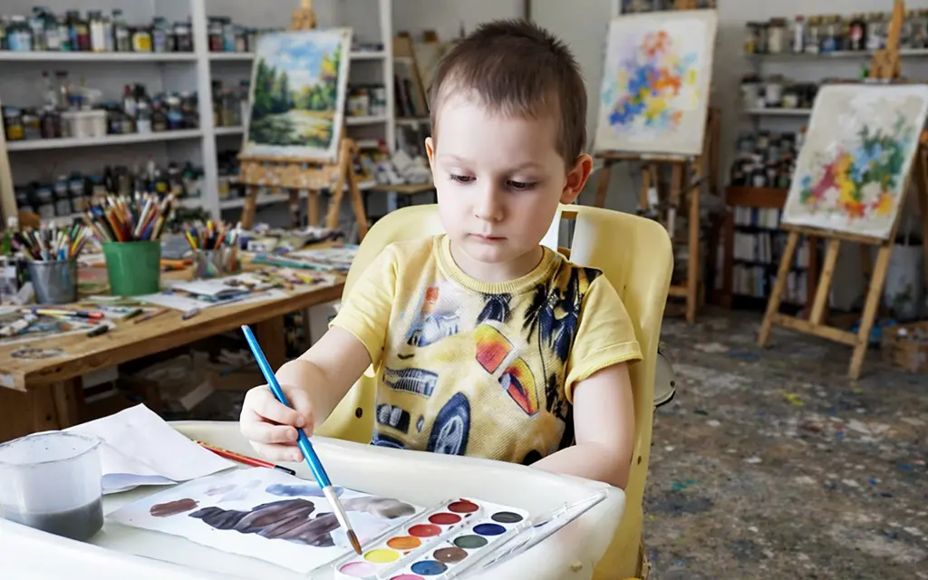 Timosha is drawing in art studio