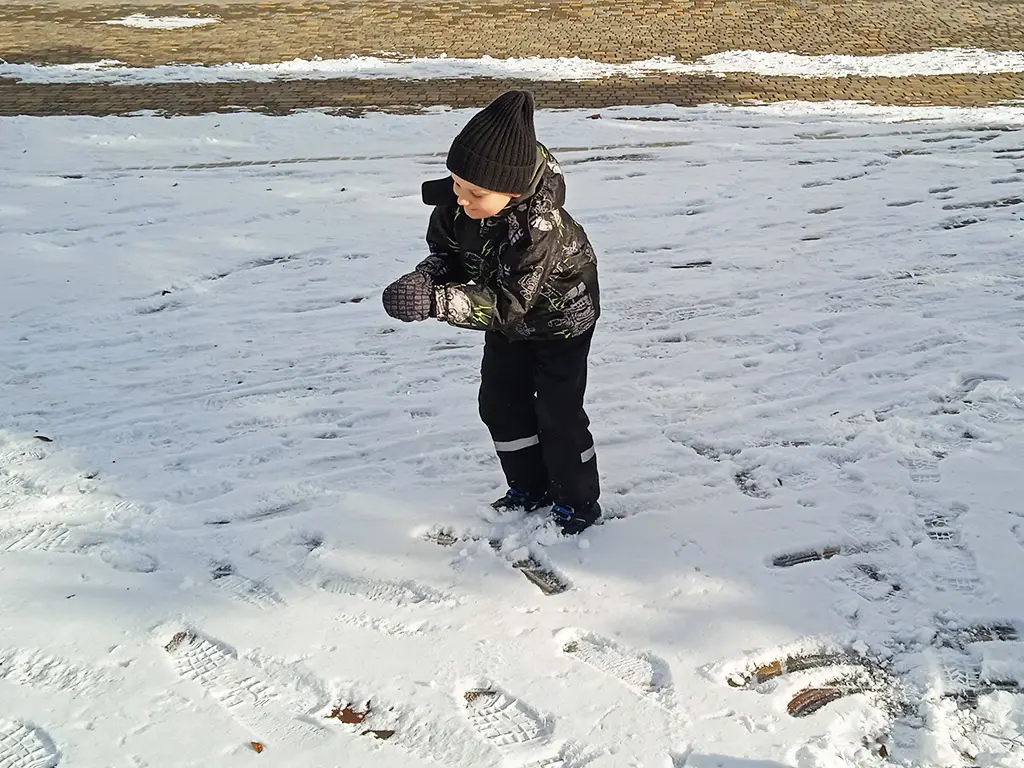 Timosha makes a snow ball