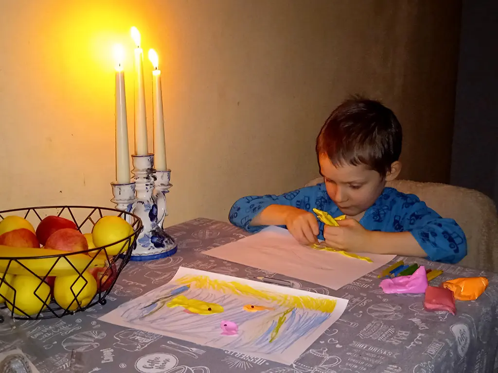 Timosha is working with soft clay